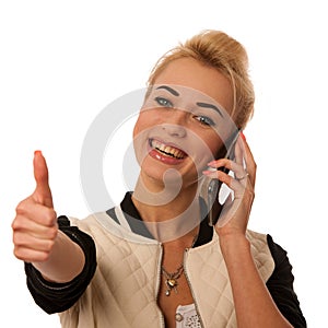 Beautiful lady with cell phone talking isolated over white