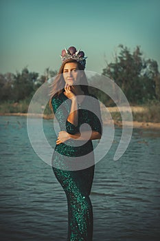 Beautiful lady in the dancing costume close up on the eastern architecture background. Mata Hari cosplay