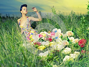 Beautiful lady in dress of flowers