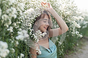 Beautiful lady in a flower garden.