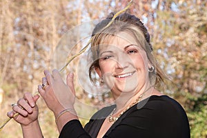 Beautiful lady posing holding onto guidewire