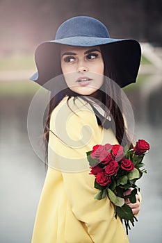 Beautiful Lady with Roses Flowers Outdoors