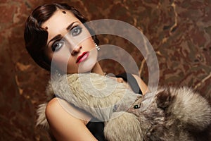 Beautiful lady waiting on the staircase