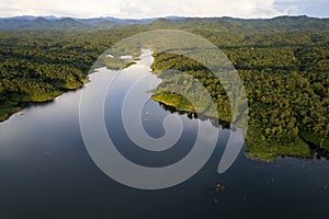 beautiful lake above the dam among blue sky clouds and mountains,lake mountain view