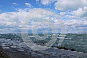 Beautiful Lake Balaton with white clouds photo