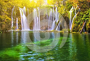 Beautiful lake in forest with waterfall of national park Plitvice