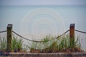 Lake Michigan Behind Roped Fencing photo