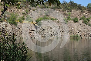 Beautiful lake among rocks and mountains. Nature reserve.