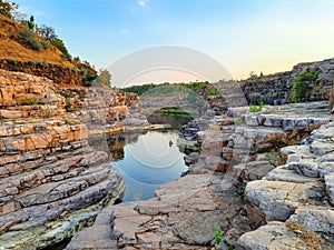 A beautiful lake surrounded by rocky mountain at Chidiya Bhadak, Indore, Madhya Pradesh, India