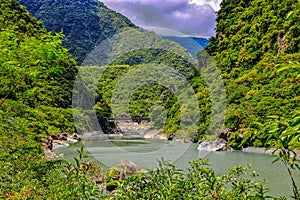 Beautiful lake view in deep valley of mountains at Creekside in Taroko National Park photo