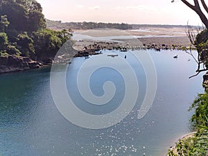 beautiful lake view from hill top with white sky and blue water lake