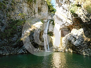 Beautiful lake with waterfall betweeneen two clifs