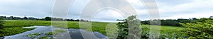 A beautiful lakeside view with clouds reflected in the surface