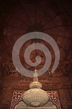 Beautiful lamp in the interior of a mosque in Delhi photo