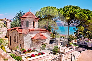 Beautiful landscape with an ancient church at the cemetery near the sea in Argostoli, Kefalonia, Greece. Stunning amazing
