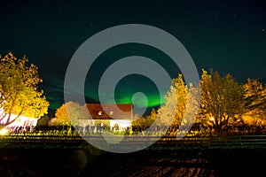 Beautiful landscape with Aurora borealis taken in Iceland on a clear sky night