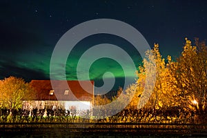 Beautiful landscape with Aurora borealis taken in Iceland on a clear sky night