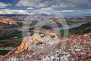 Beautiful landscape from the base of Fitz Roy, in the background lakes, snowy mountains and forests of lengas, Chalten, Argentina