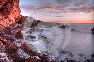 Beautiful landscape blue sea and waves near the rocks