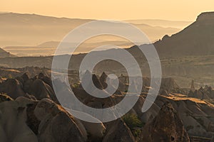 Beautiful landscape of Cappadocia plateau in a morning sunrise, central Anatolia region in summer season, Turkey