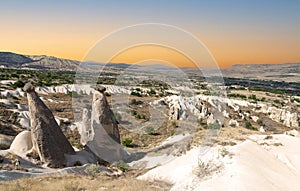 Beautiful landscape Cappadocia stone and old cave house with horse tour in Goreme national park Turkey Sunset