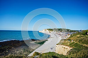 Beautiful landscape on the cliff, city of Etretat and the English Channel in sunny spring day. Etretat, Seine-Maritime