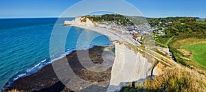 Beautiful landscape on the cliff, city of Etretat and the English Channel in sunny spring day. Etretat, Seine-Maritime