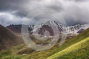 Beautiful landscape with clouds over mountains. Nature landscape.