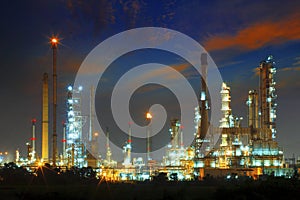 beautiful landscape dusky sky of heavy industry oil refinery plant with dazzled lighting