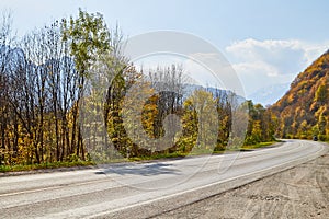 Beautiful landscape with empty road in the mountains in summer or autumn day