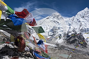 Beautiful Landscape of Everest and Lhotse peak with colorful Nepali flag as foreground from Kala Pattar view point.