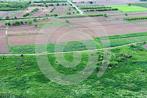 Beautiful landscape with fresh plowed land and meadow