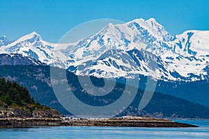 Landscape of the Glacier Bay with high glaciated coast mountains photo