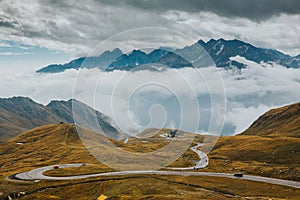 Beautiful landscape from the Grossglockner National Park Hohe Tauern, Austria. Alpine road in autumn and foggy weather