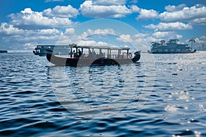 Beautiful landscape with a house boating in marine drive, Kochi, India. Travel and tourism Kerala - houseboat on