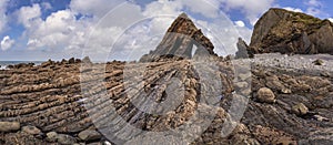 Beautiful landscape image of Blackchurch Rock on Devonian geological formation on beautiful Spring day