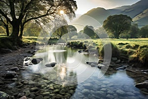 Beautiful landscape image of Lake District England with sun setting over the river