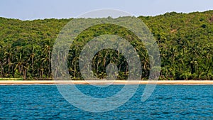 Beautiful landscape of the Indian ocean with coconut trees