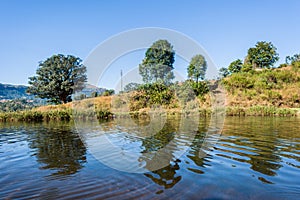 Beautiful landscape of a lake, hills, and valleys