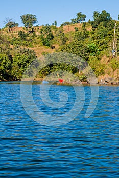 Beautiful landscape of a lake, hills, and valleys