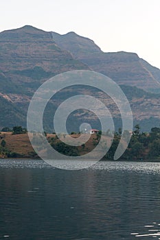 Beautiful landscape of a lake, hills, and valleys