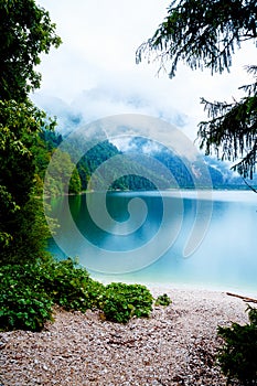 Beautiful landscape, lake with mountain in summer rain.