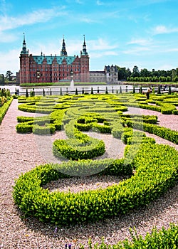 beautiful landscape with magical incredible gardens and park Frederiksborg slot Castle near Copenhagen. Hillerod, Denmark. Exotic photo