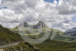 Beautiful landscape in Montenegro with fresh grass and beautiful peaks. Durmitor National Park in Montenegro part of Dinaric Alps.