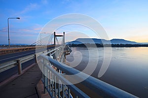 beautiful landscape with morning light of laos japan bridge crossing mekong river in champasak southern of laos