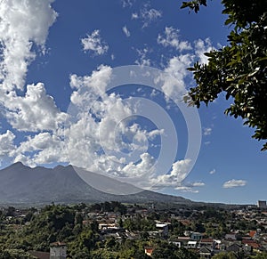 Beautiful landscape morning view of Mount Salak or Gunung Salak taken from batu tulis area in central Bogor city Indonesia