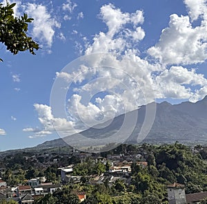 Beautiful landscape morning view of Mount Salak or Gunung Salak taken from batu tulis area in central Bogor city Indonesia