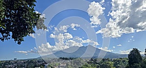 Beautiful landscape morning view of Mount Salak or Gunung Salak taken from batu tulis area in central Bogor city Indonesia