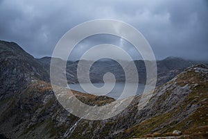 A beautiful landscape of a mountain lake in Folgefonna National Park in Norway. Overcast autumn day in mountains.