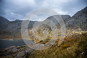 A beautiful landscape of a mountain lake in Folgefonna National Park in Norway. Overcast autumn day in mountains.